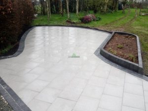 Patio with Silver Granite Slabs and Raised Flower-Bed in New Ross, Co. Wexford