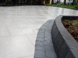 Patio with Silver Granite Slabs and Raised Flower-Bed in New Ross, Co. Wexford