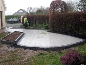 Patio with Silver Granite Slabs and Raised Flower-Bed in New Ross, Co. Wexford