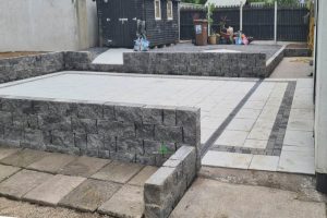 Silver Granite Patio with Charcoal Setts and Connemara Walling in New Ross, Co. Wexford