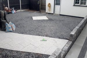 Silver Granite Patio with Charcoal Setts and Connemara Walling in New Ross, Co. Wexford