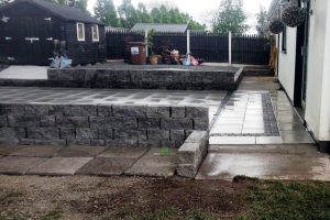 Silver Granite Patio with Charcoal Setts and Connemara Walling in New Ross, Co. Wexford